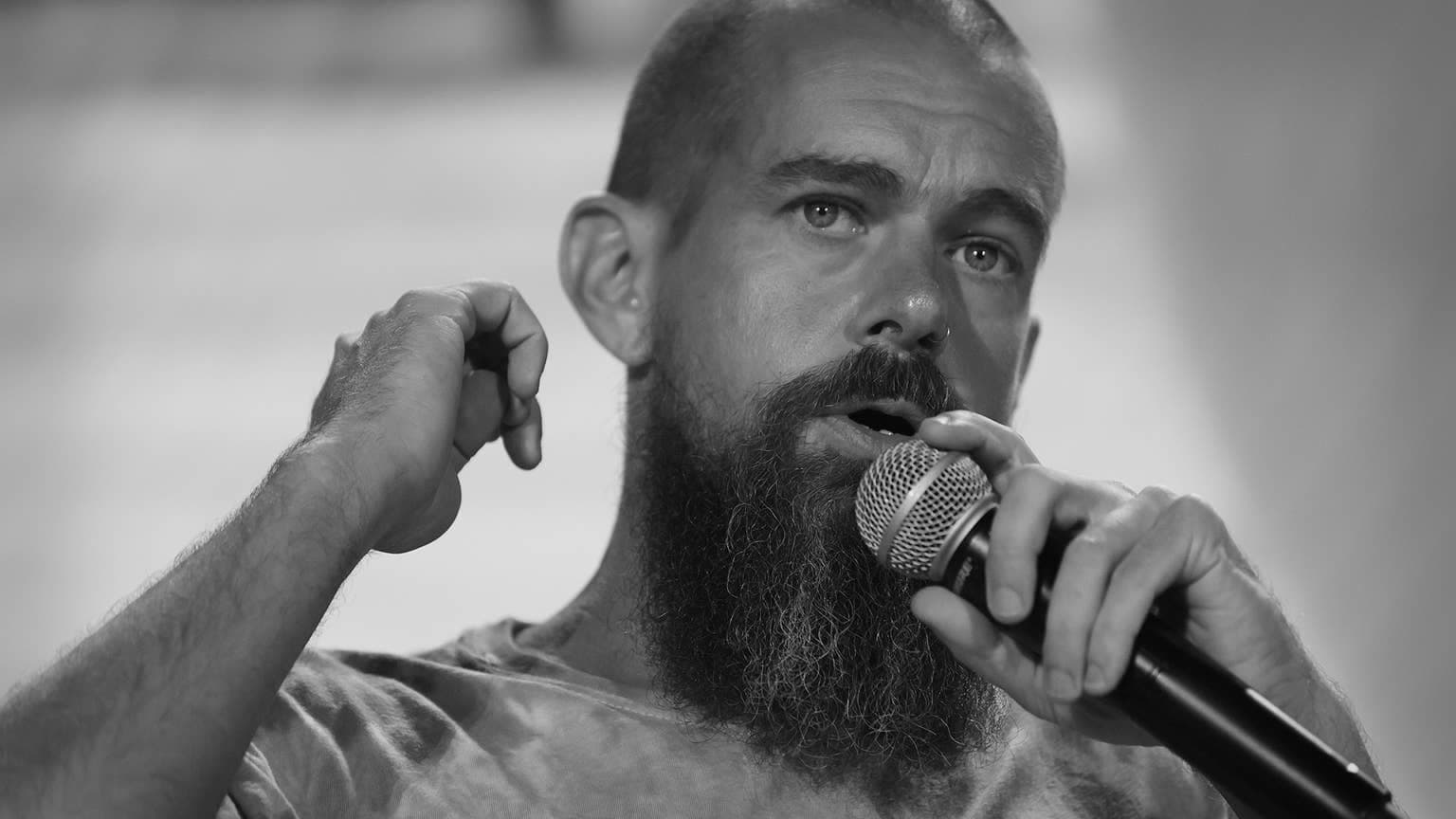 Jack Dorsey speaking into a microphone